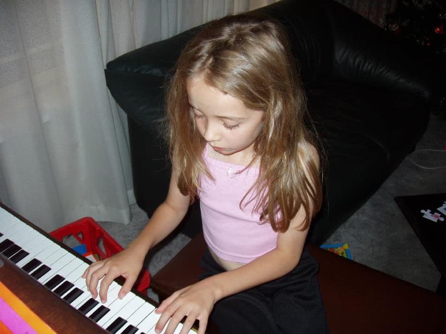Young Jasmine at the piano
